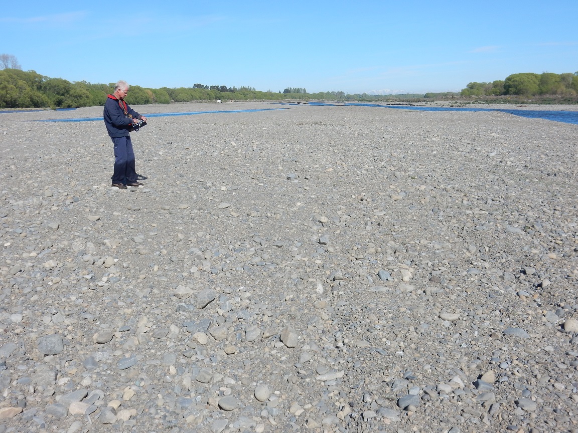 The island is finished and Group member, Grant Davey, is using his field tablet to photograph and GPS the nest of a wrybill pair which have chosen to breed in this deliberately prepared site. Their nest is almost precisely where the tractor was working (6 weeks earlier) in the photo at the top of this post.